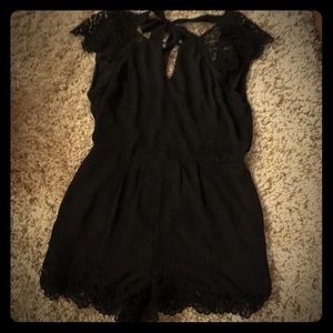 Open back Bebe jump shorts with lace